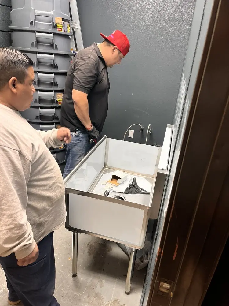 Commercial plumbing and sink installation in Bryan